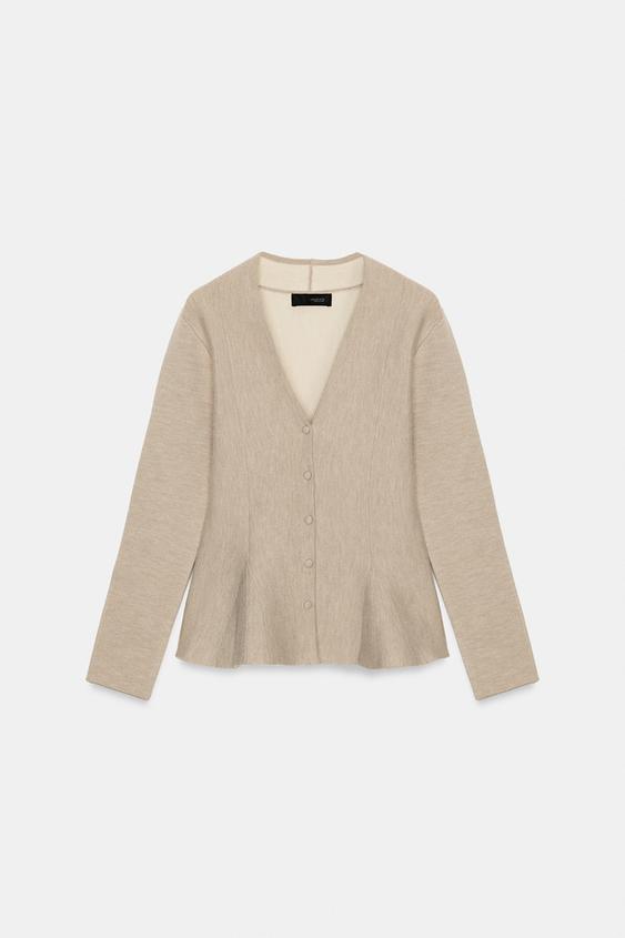 Veste en maille peplum