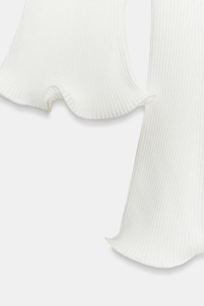 Robe en maille côtelée à finition ondulée