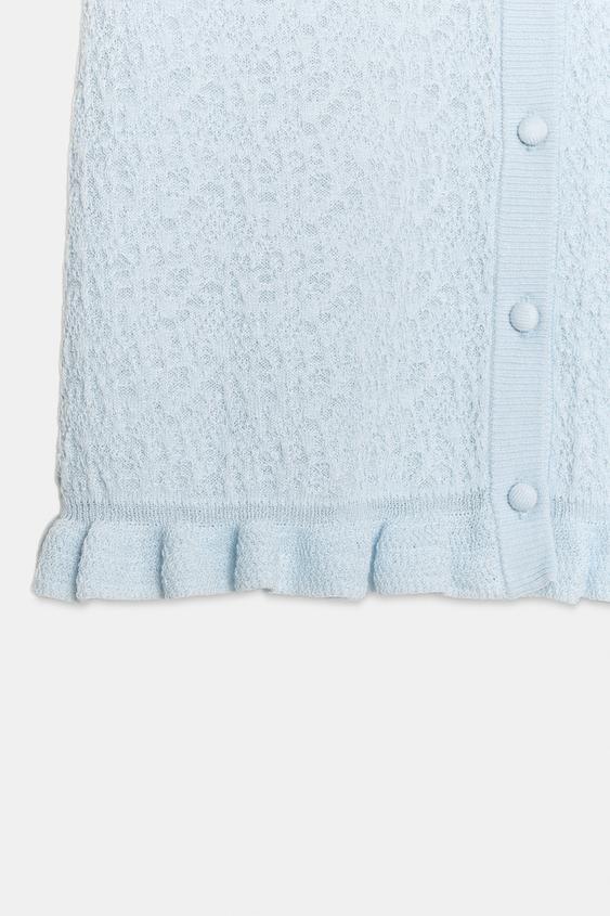 Veste en maille structurée à volants