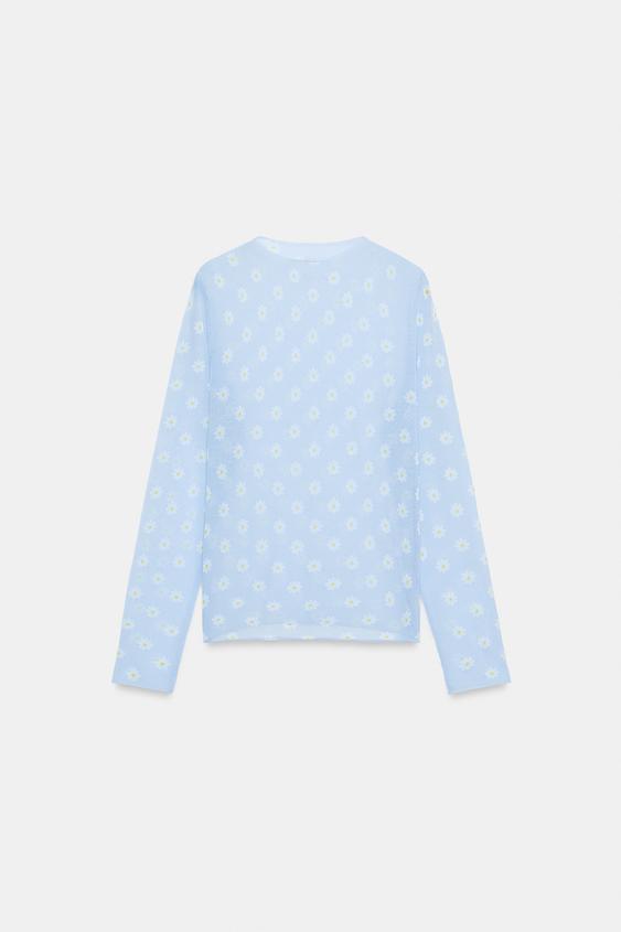 Top en maille semi-transparente à fleurs