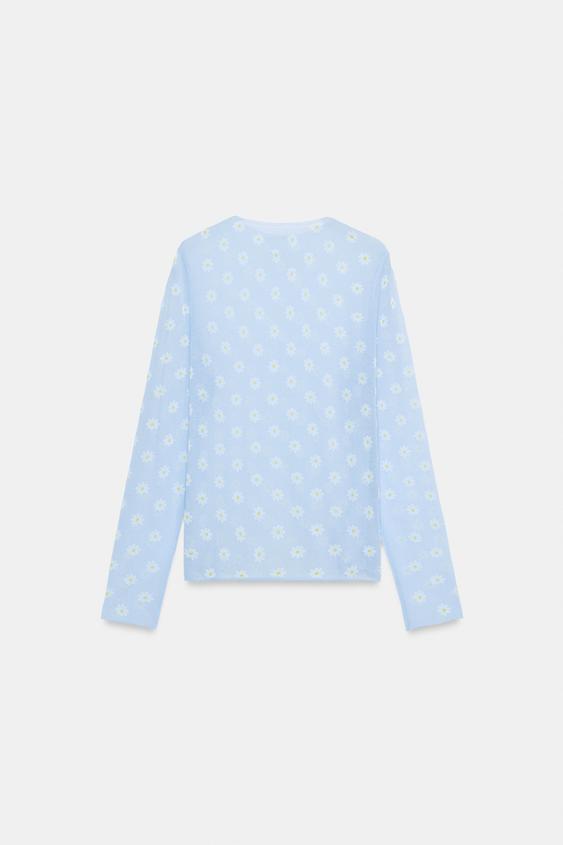 Top en maille semi-transparente à fleurs