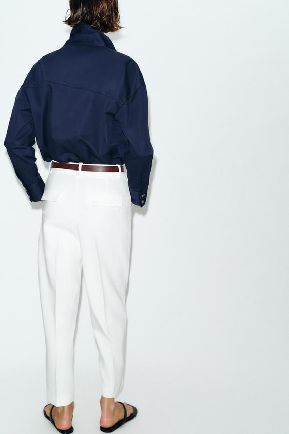 Pantalon à pinces avec ceinture