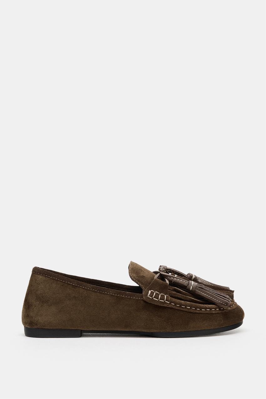 Mocassin en cuir à pompons