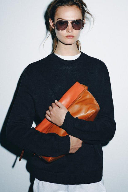 Pochette enveloppe en cuir à rabat